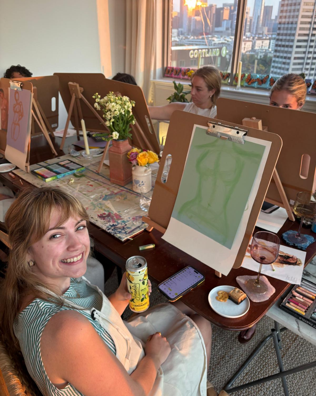 Painting and smiling.png__PID:45d86896-9da9-4ba1-9ea0-eead23cb0721